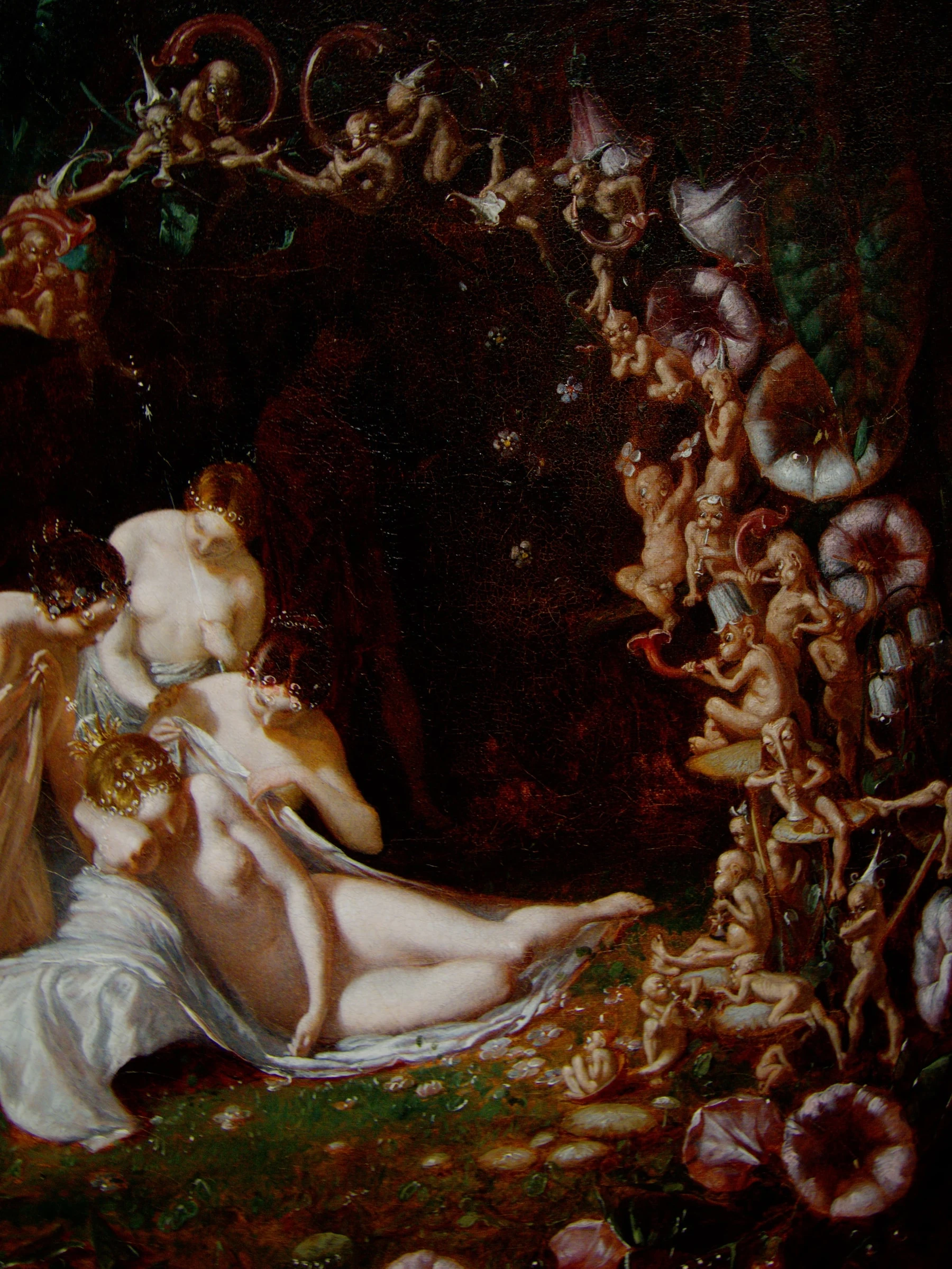 Titania asleep among flowers and fairies